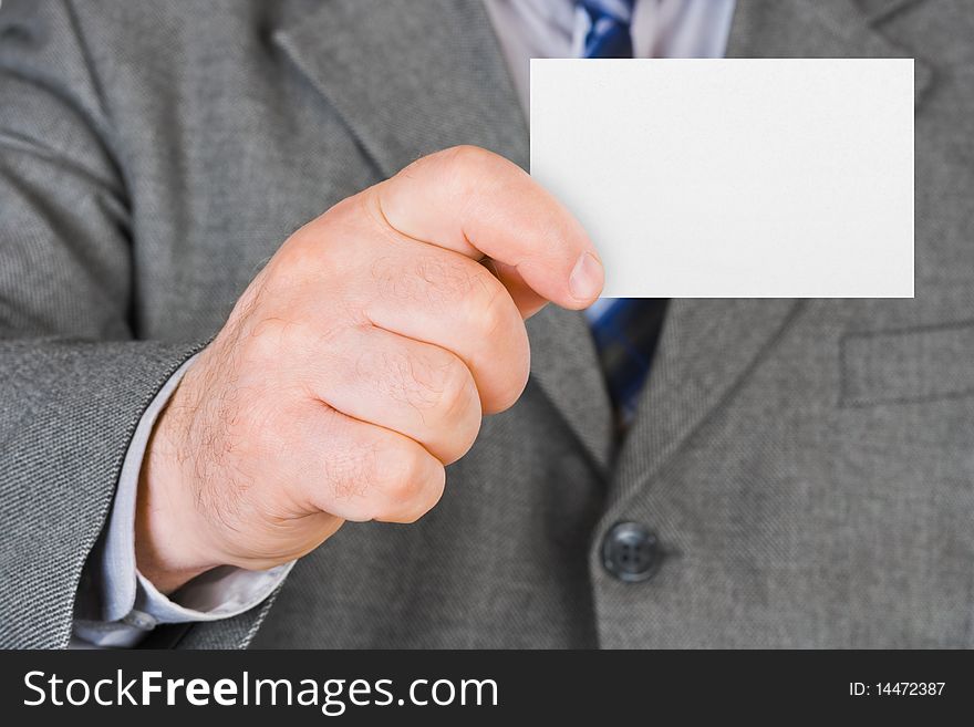 Paper card in hand - business background