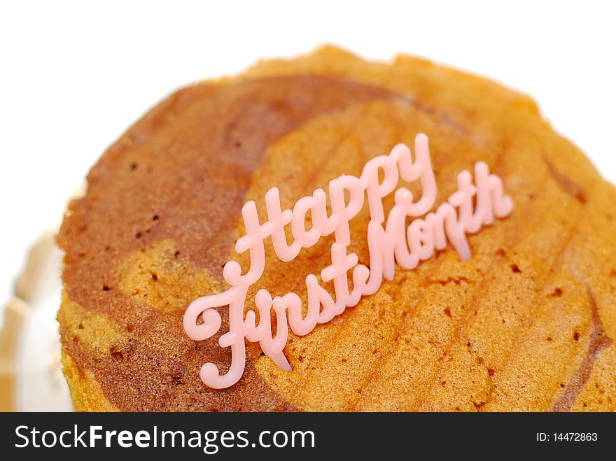 Delicious butter sponge cake for celebrating a baby's first month anniversary isolated on white background. Suitable for celebration, festivals, and food and beverage concepts. Delicious butter sponge cake for celebrating a baby's first month anniversary isolated on white background. Suitable for celebration, festivals, and food and beverage concepts.