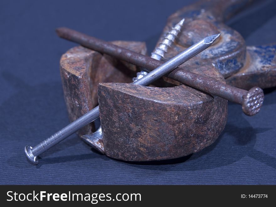 Contrast between old and new. nails and tools. Contrast between old and new. nails and tools