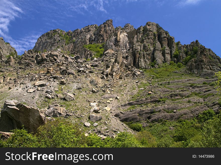 Mountain landscape, rock and stone chaos, against the blue sky