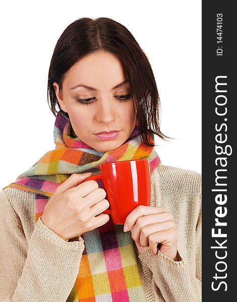 Yougn beautiful woman in warm scarf with a cup of tea. Yougn beautiful woman in warm scarf with a cup of tea