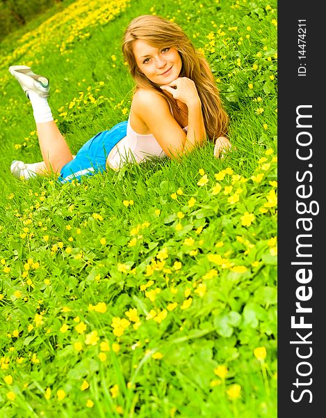 Young smiling woman on the meadow. Young smiling woman on the meadow
