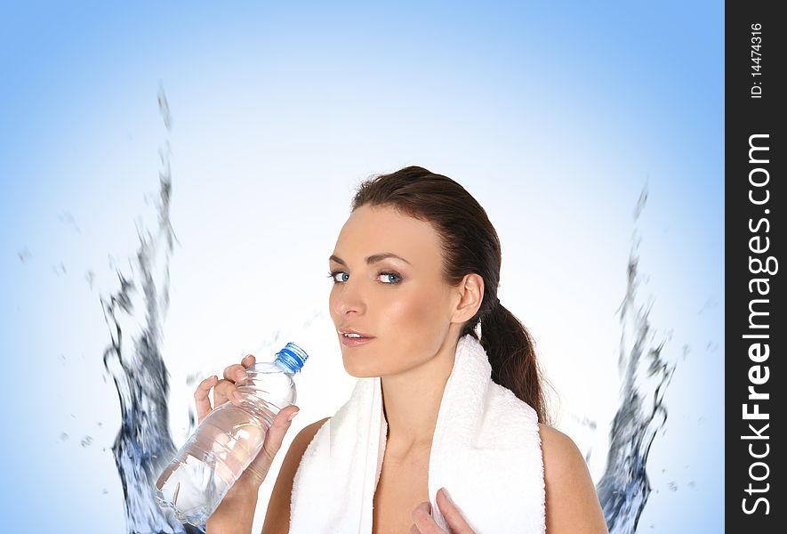 A young and sporty female is drinking fresh water after training. Image isolated on an abstract water background. A young and sporty female is drinking fresh water after training. Image isolated on an abstract water background.
