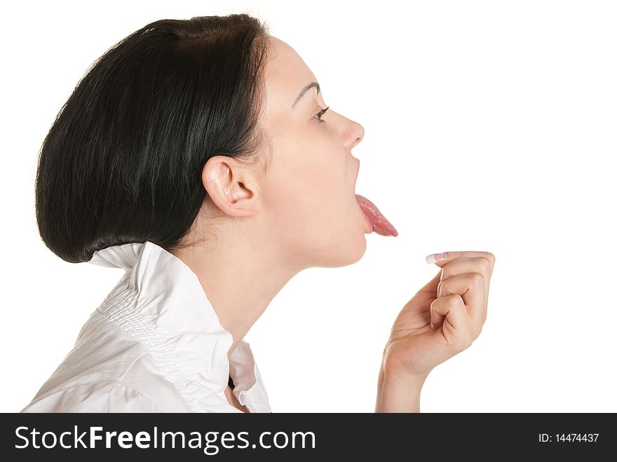 Young woman stick one's tongue out isolated in white