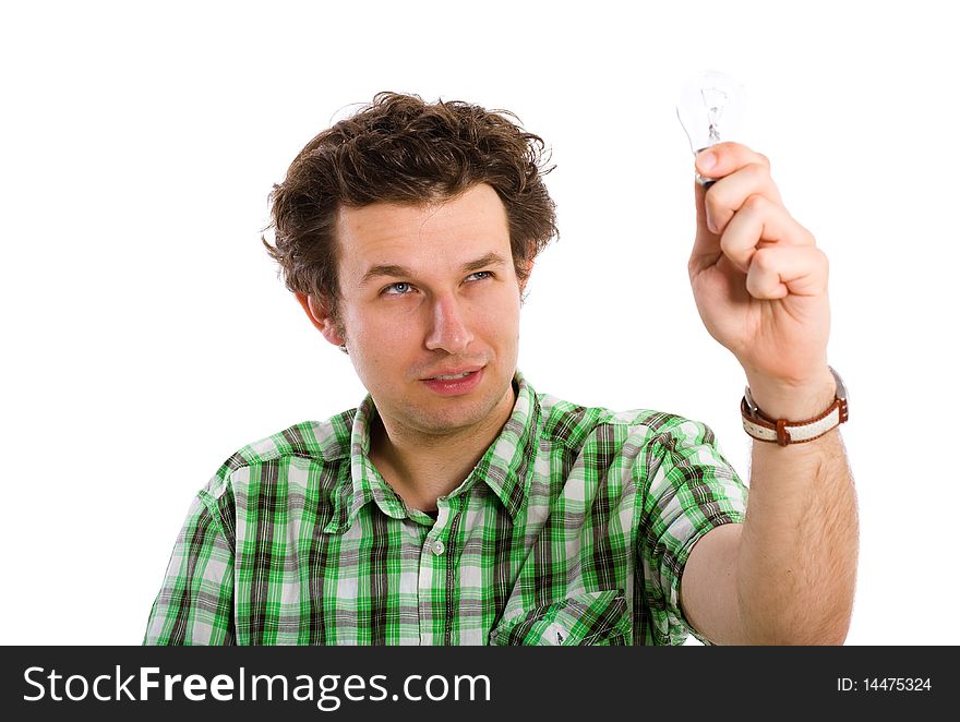 Young male scientisc looking at old style lightbulb, isolated on white. Young male scientisc looking at old style lightbulb, isolated on white