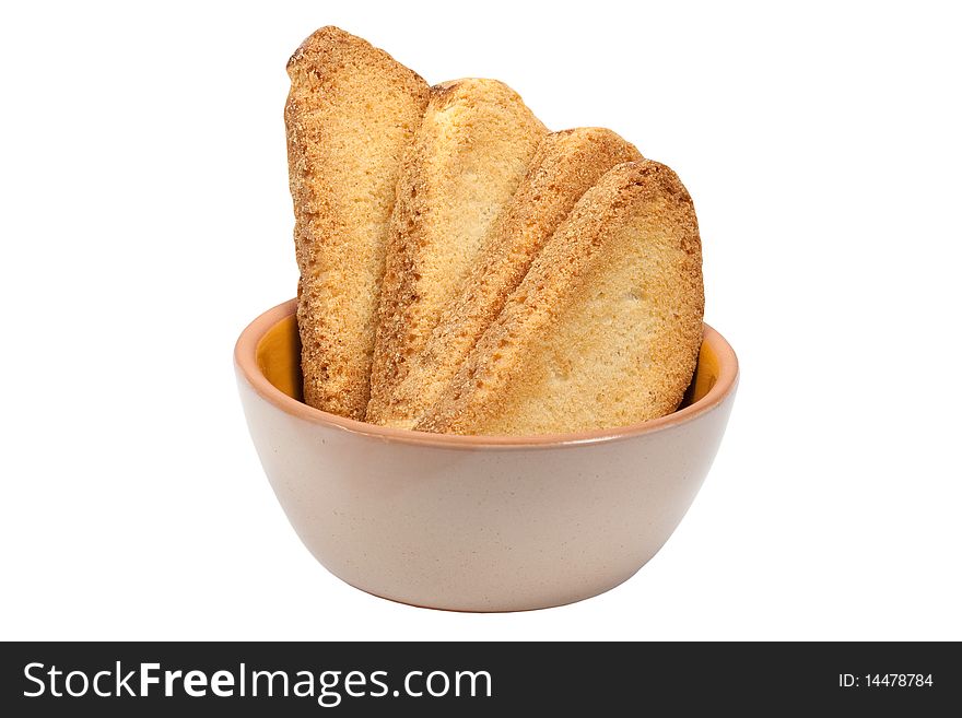 Crackers in a plate it is isolated on a white background