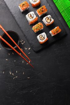 Set Of Sushi And Maki On Stone Table. Top View With Copy Space Royalty Free Stock Images