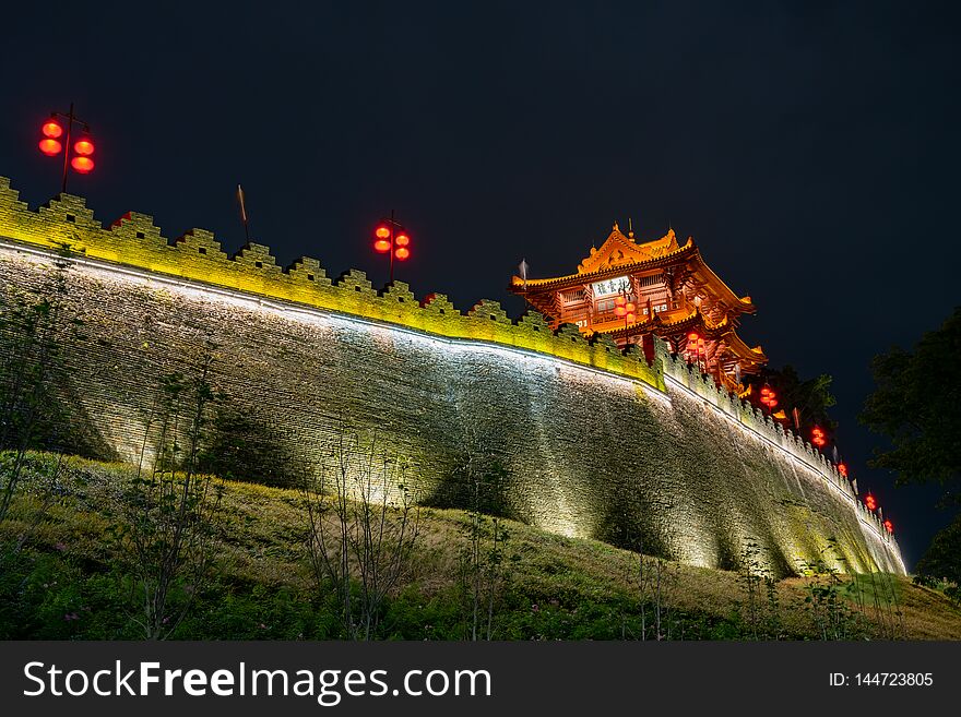 Night view of the Zhaoqing Ancient City Wall with Pi Yun Lou building