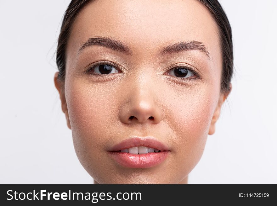 Dark-eyed Woman With Nice Appearance Feeling Confident