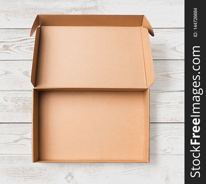 Open cardboard box top view isolated with no shadows clipping path included