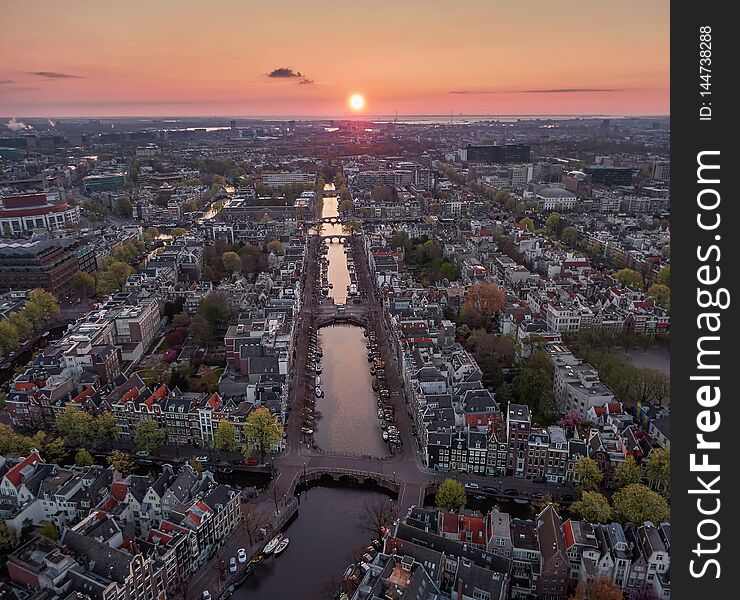 Aerial sunrise over the Amsterdam canals