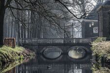 Mysterious Bridge Reflected In Water On A Foggy Morning  In Laren, Netherlands Royalty Free Stock Photography