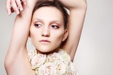 Woman In A Rose Necklace And With Wedding Make-up Stock Images Woman In A Rose Necklace And With Wedding Make-up Stock Images