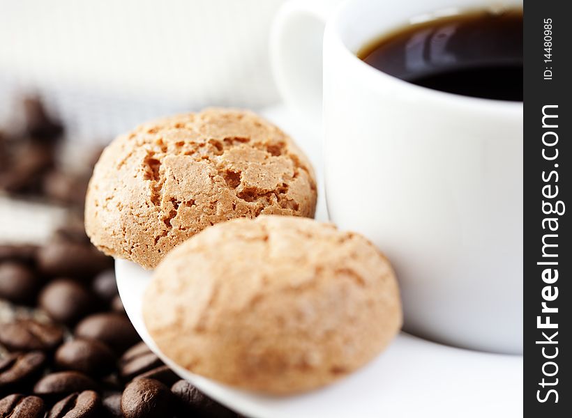 Close up of biscotti and a cup of black coffee. Close up of biscotti and a cup of black coffee