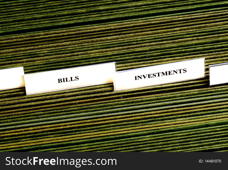 File tabs for investments and several blank file tabs. File tabs for investments and several blank file tabs