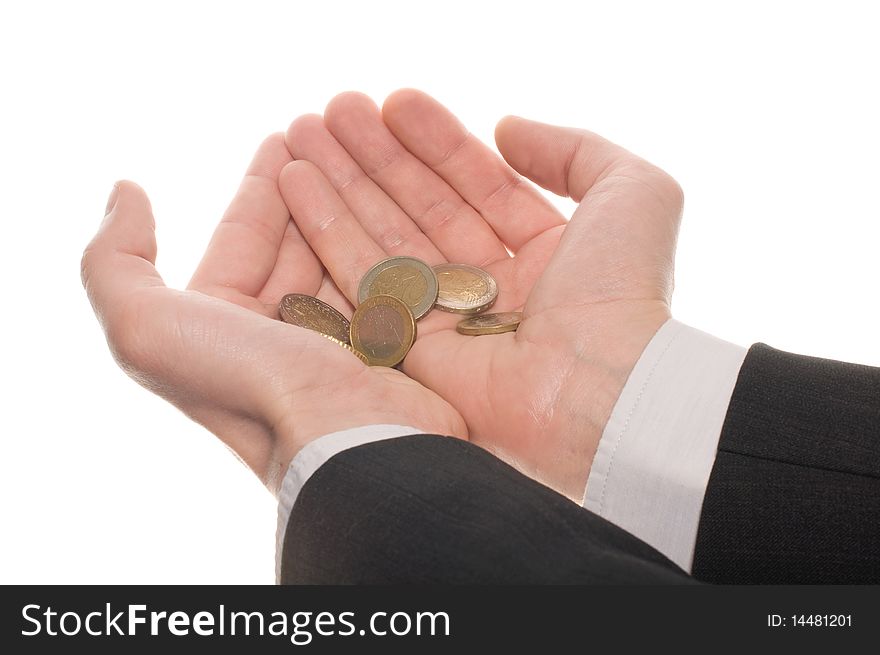 Businessman's hand with euro coins isolated on white background