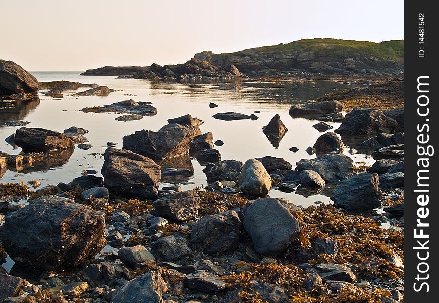 Anglesea wales coastal path sea view and rock pool with sea weed