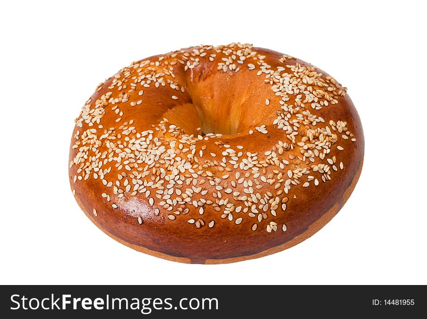 Bagel, isolated on white, with sesame seeds.
