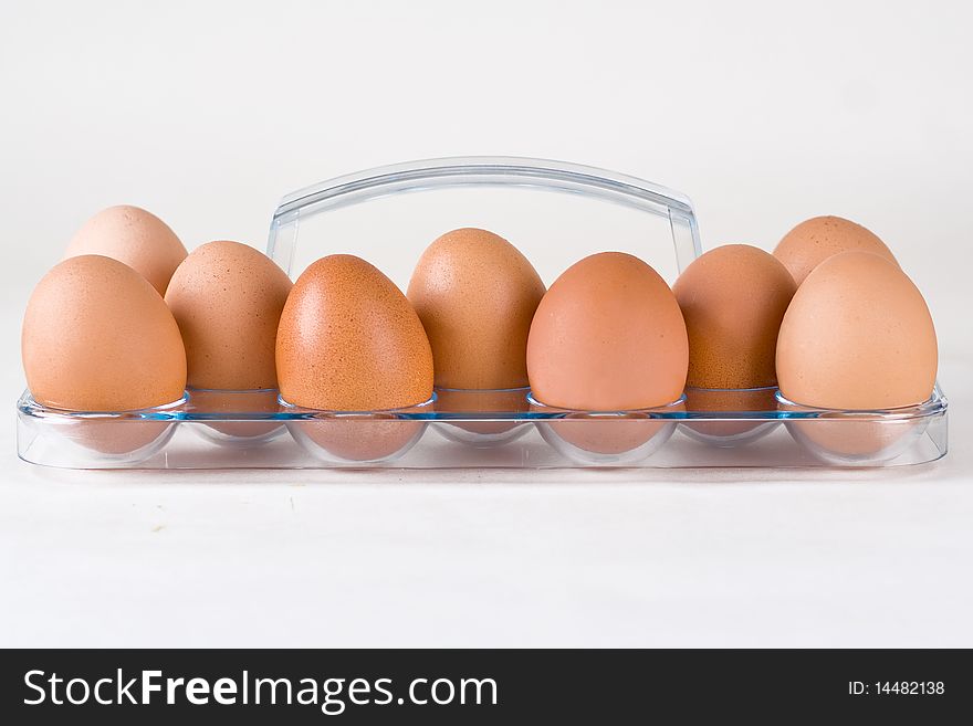 Brown eggs isolated on white background