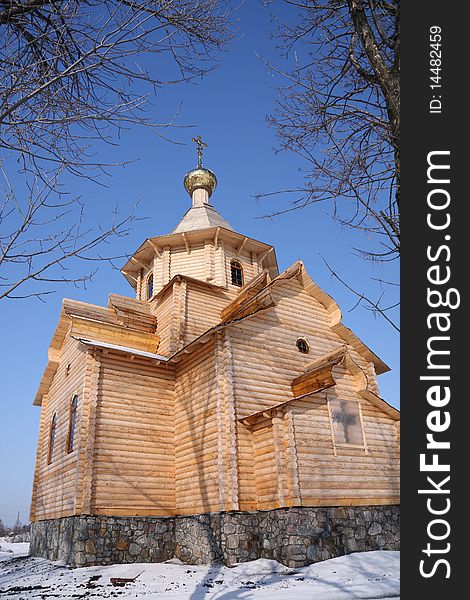 Wooden church under blue sky