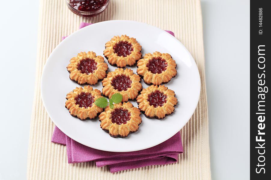 Shortbread cookies with jam dipped in chocolate. Shortbread cookies with jam dipped in chocolate
