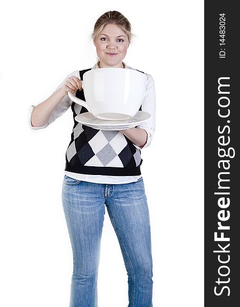 Portrait of beautiful blond girl holding a white cup