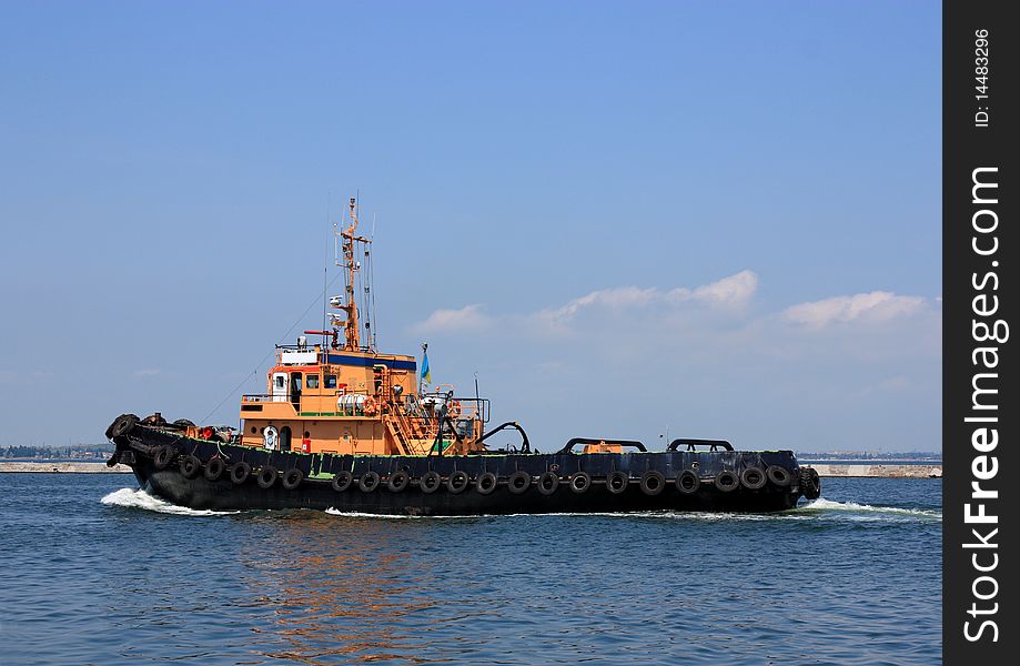 Moving tugboat