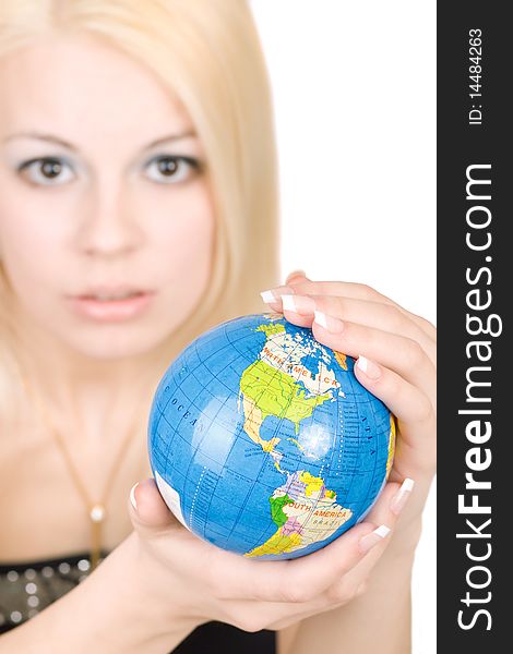 Young blond women holding a globe and with petition looks into the camera. Young blond women holding a globe and with petition looks into the camera