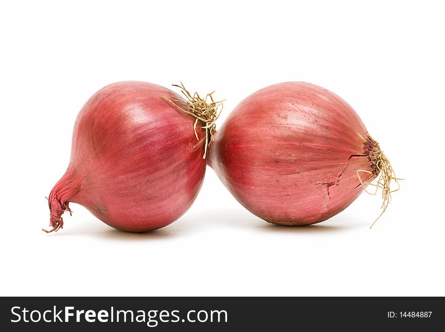 Fresh red onions isolated on white background