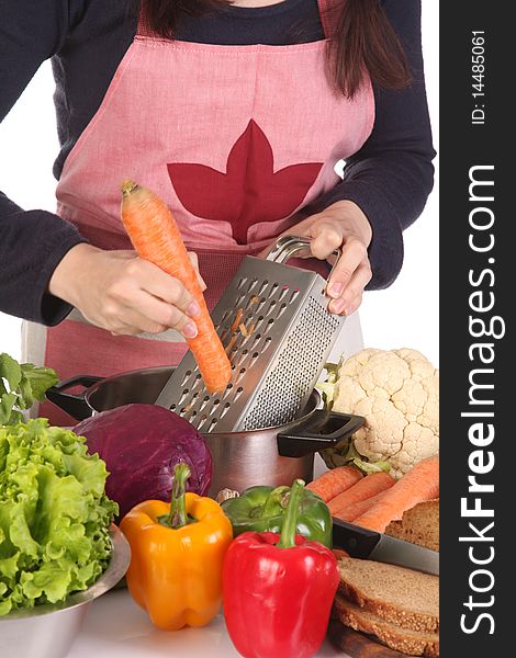 Details of cutting carrot with stainless grater