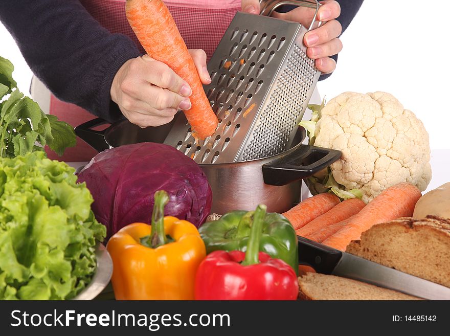 Details of cutting carrot with stainless grater