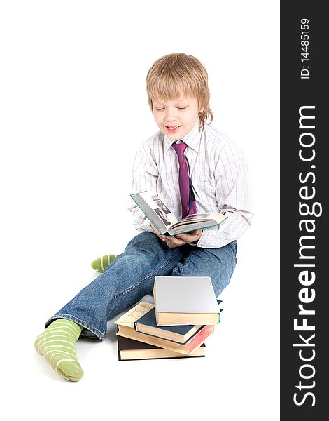 Young boy reading book isolated