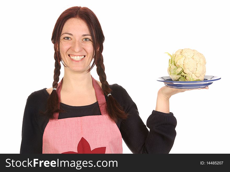 Beautiful housewife holding plate with cauliflower