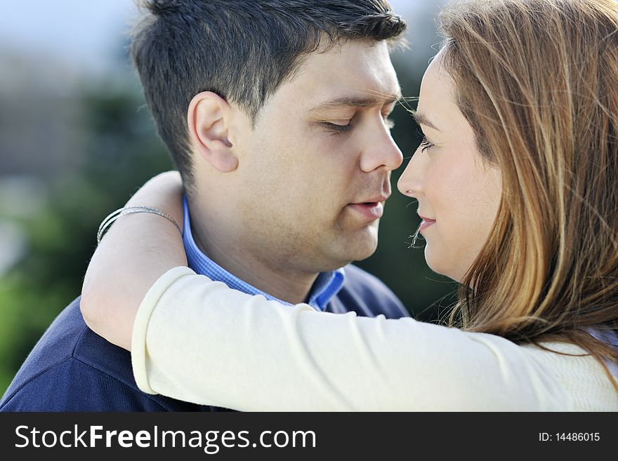 Happy young couple have good time and fun outdoor at beautiful sunny day. Happy young couple have good time and fun outdoor at beautiful sunny day