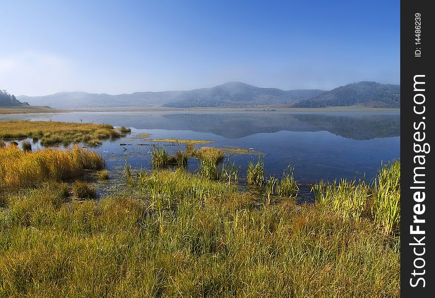 Mountain lake high in the mountains in the morning