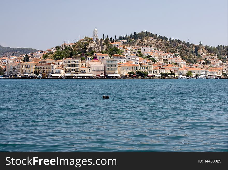 The town of Poros, on the homonymous island (Greece). The town of Poros, on the homonymous island (Greece)