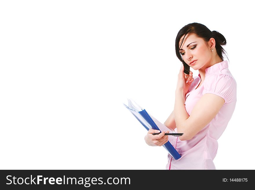 Portrait of a attractive young girl in pink blouse with papers on white background.