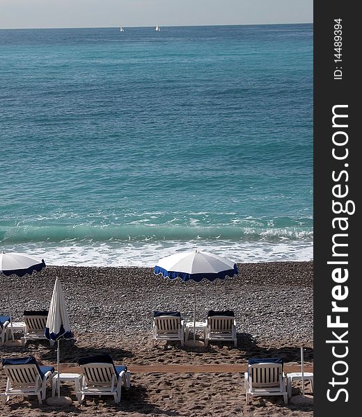 Sun Loungers On The Beach At Nice