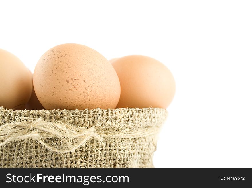 Many eggs are in the bag. Isolated on white background