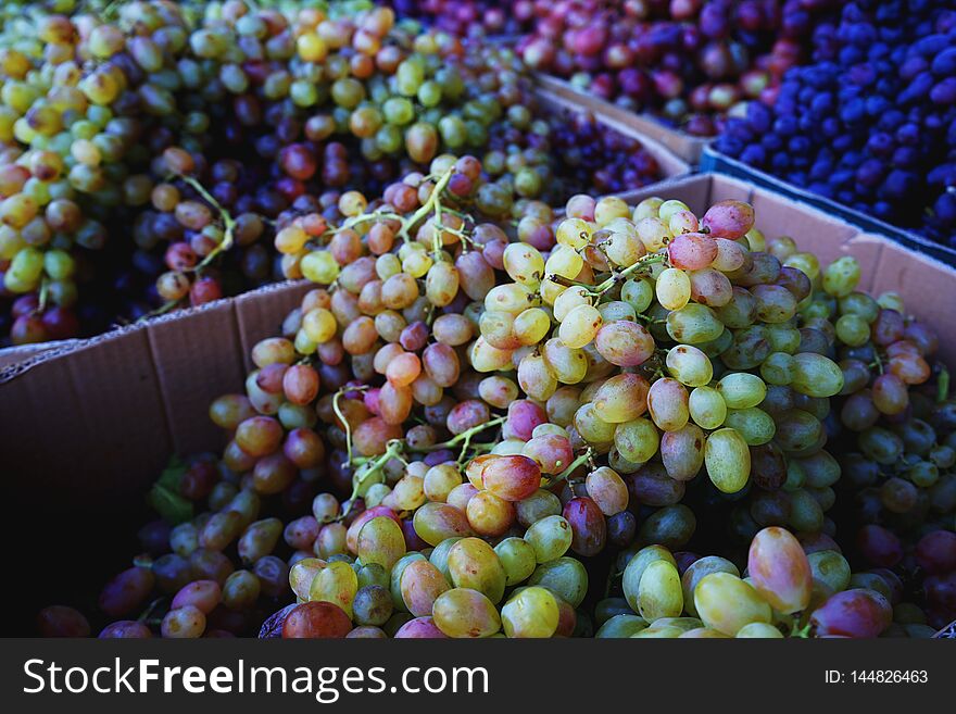 Varieties of sweet grape cluster retail display at Xinjiang, China