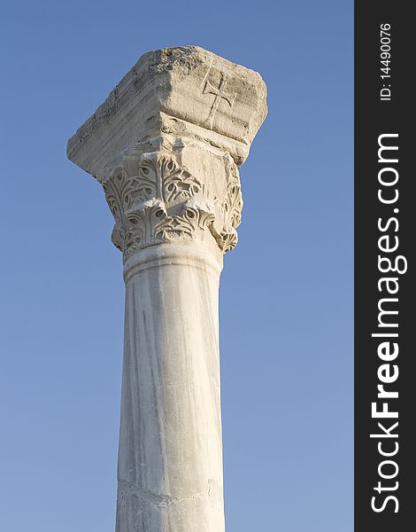 Old classical column over clear blue sky. Old classical column over clear blue sky