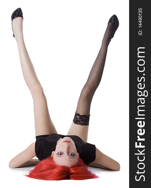 Picture of red hair woman in black stockings lying down on the floor