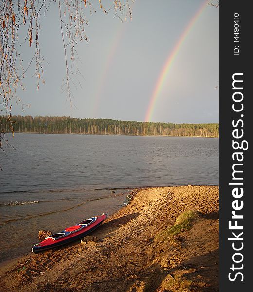 Double rainbow after thunderstorm in Karelia (Russia) during kayak travel. Double rainbow after thunderstorm in Karelia (Russia) during kayak travel