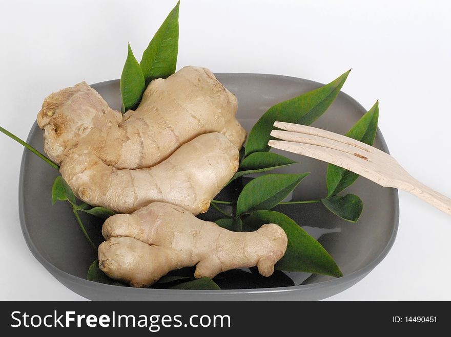 Ginger root in a dish