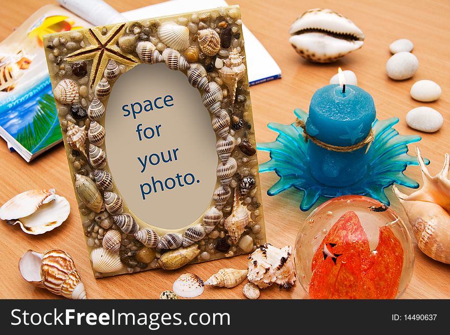 Seashell frame. Vacation memories. (With clipping path.)