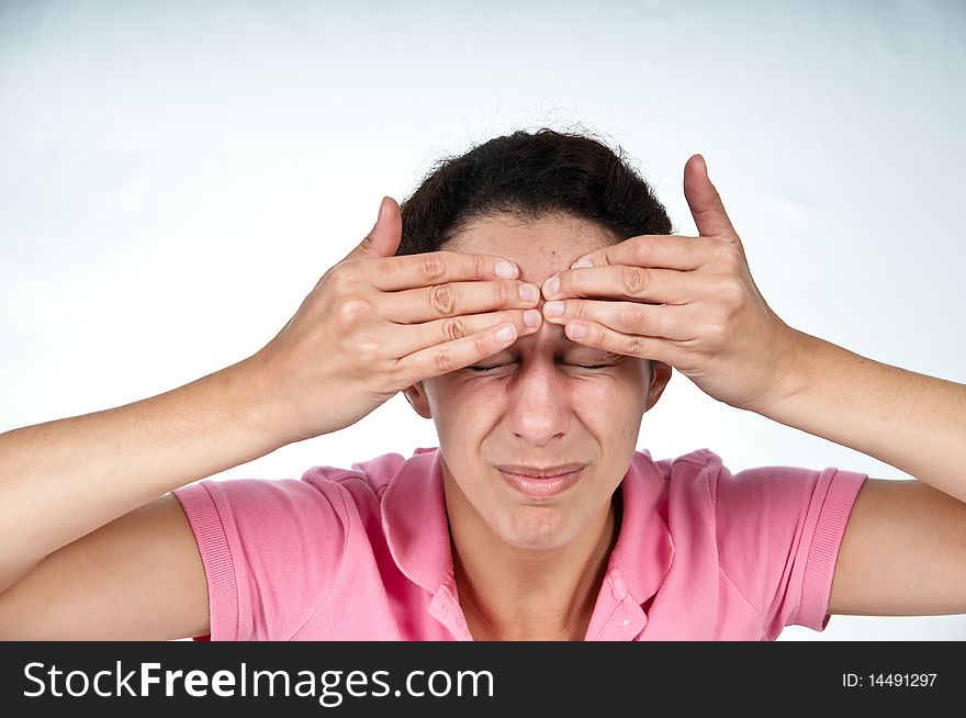 Woman in pain, squeezing forehead with her fingers. Woman in pain, squeezing forehead with her fingers