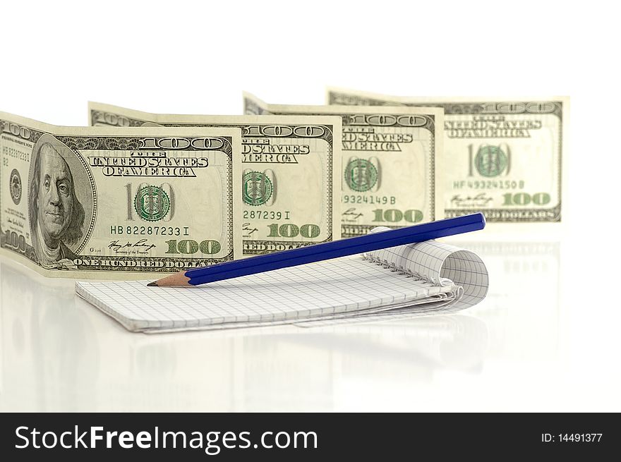 One hundred dollar notes against the white background. One hundred dollar notes against the white background