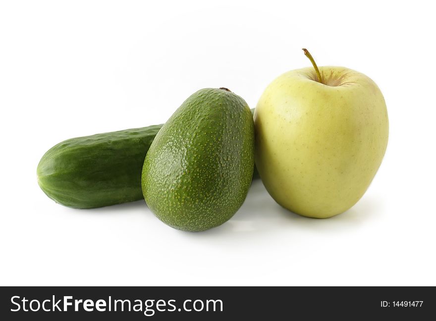 Apple avocado and cucumber on a white background