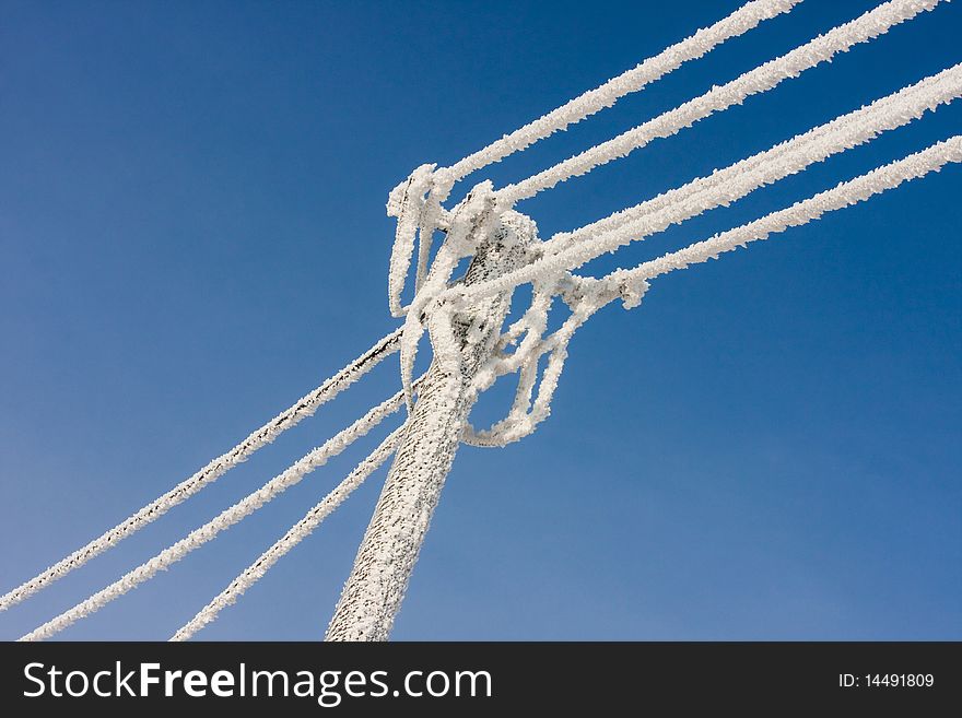 Hoar frost on the telephonic line in cold day