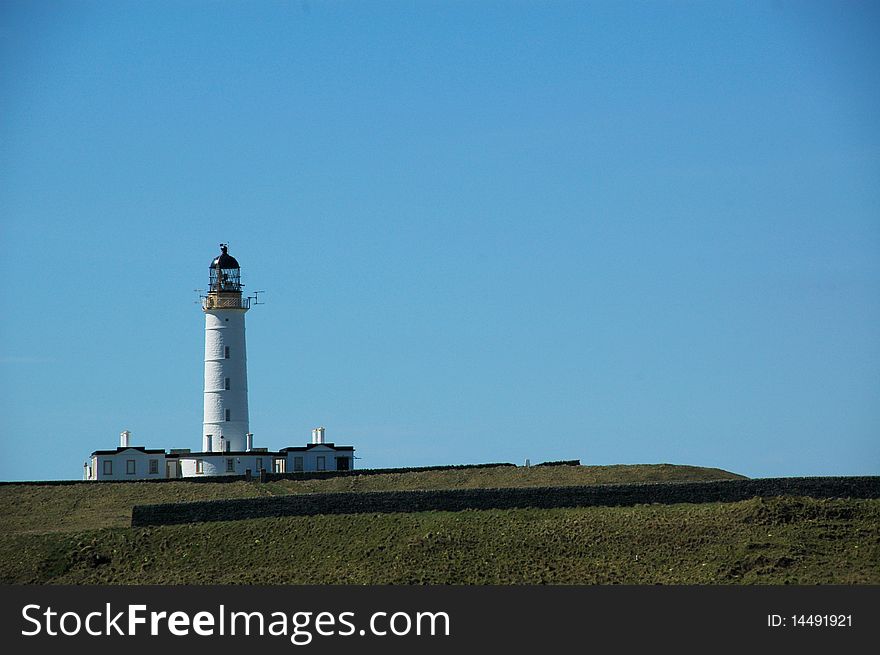 Portnahaven Lighthouse on the isle of Islay in Scotland